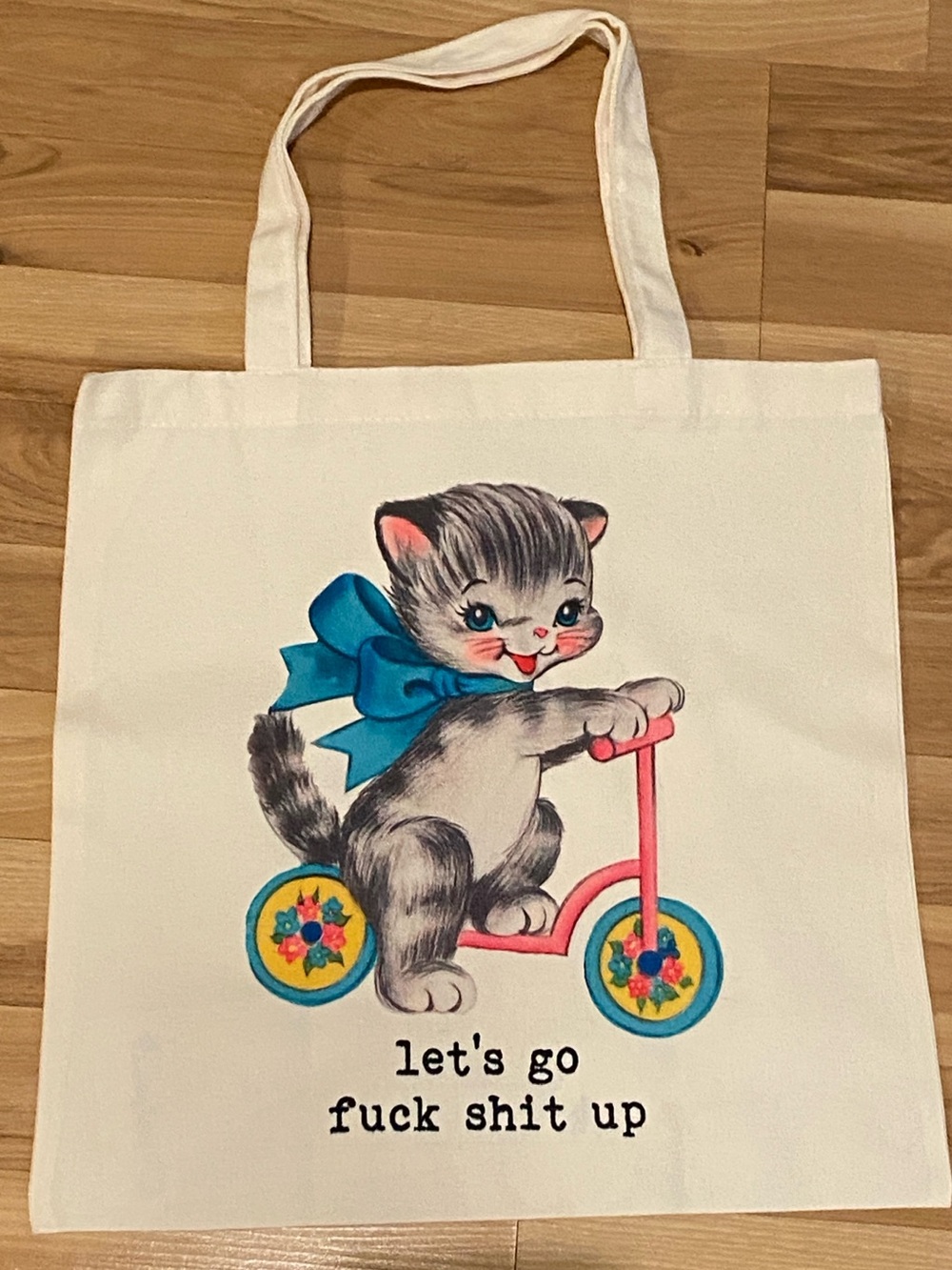 Vintage-Style Cat on Scooter Canvas tote bag